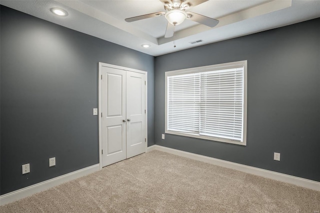 382 Golden Ln, Poplar Bluff, MO 63901 - carpeted spare room featuring a ceiling fan, baseboards, recessed lighting, and a tray ceiling