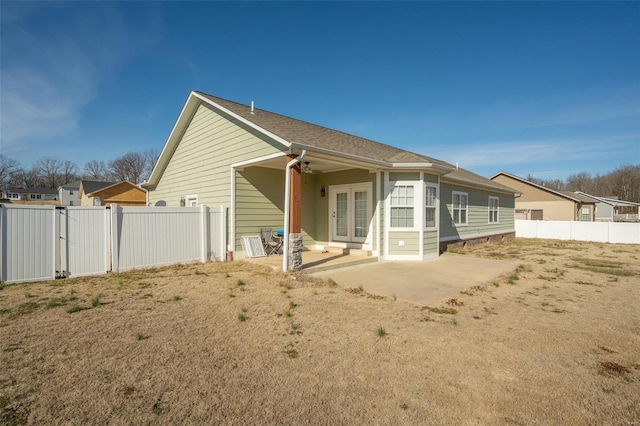 382 Golden Ln, Poplar Bluff, MO 63901 - rear view of property featuring a patio, french doors, and fence