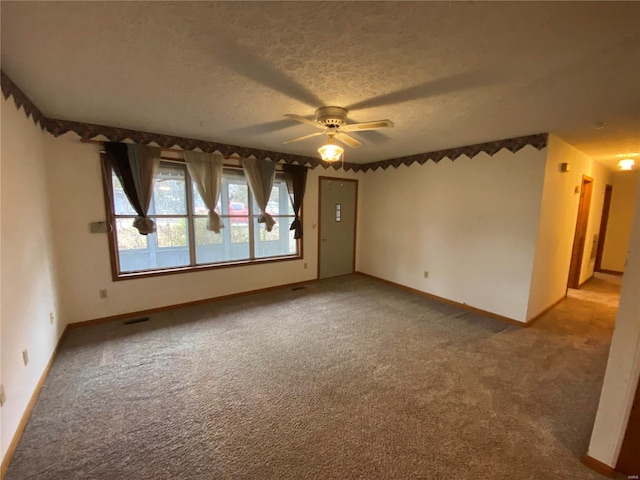 16340 Caldwell Ln, Dixon, MO 65459 - carpeted empty room featuring a ceiling fan, a textured ceiling, and baseboards