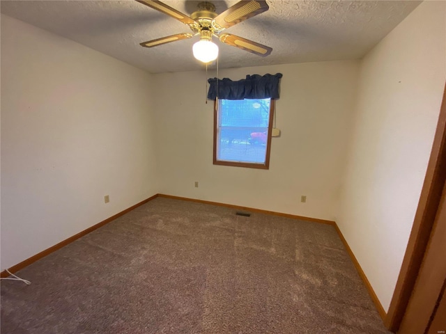 16340 Caldwell Ln, Dixon, MO 65459 - empty room with a textured ceiling, ceiling fan, carpet flooring, and baseboards
