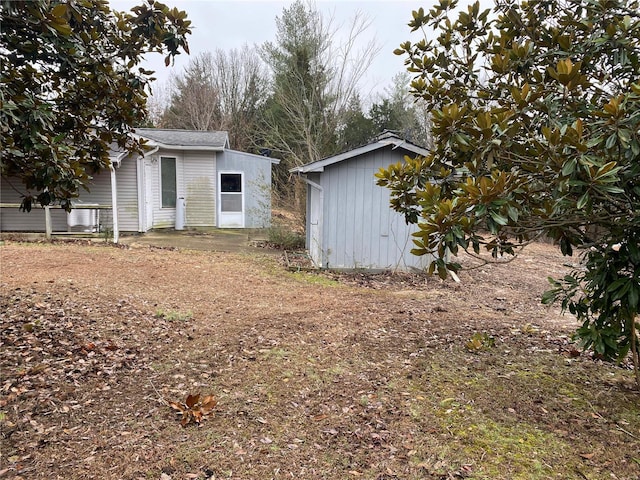 16340 Caldwell Ln, Dixon, MO 65459 - view of yard featuring a shed and an outdoor structure
