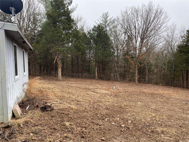 16340 Caldwell Ln, Dixon, MO 65459 - view of yard featuring fence and a view of trees