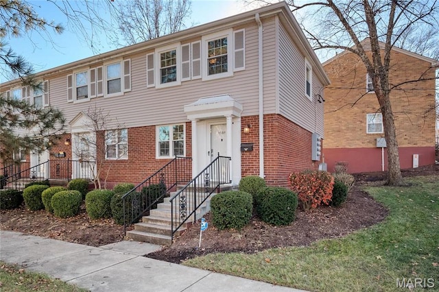 1508 Swallow Dr, Saint Louis, MO 63144 - townhome / multi-family property featuring brick siding