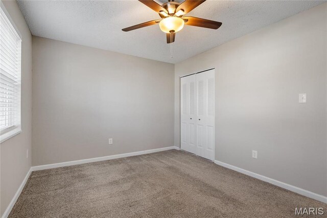 1508 Swallow Dr, Saint Louis, MO 63144 - carpeted spare room featuring a ceiling fan, baseboards, and a textured ceiling