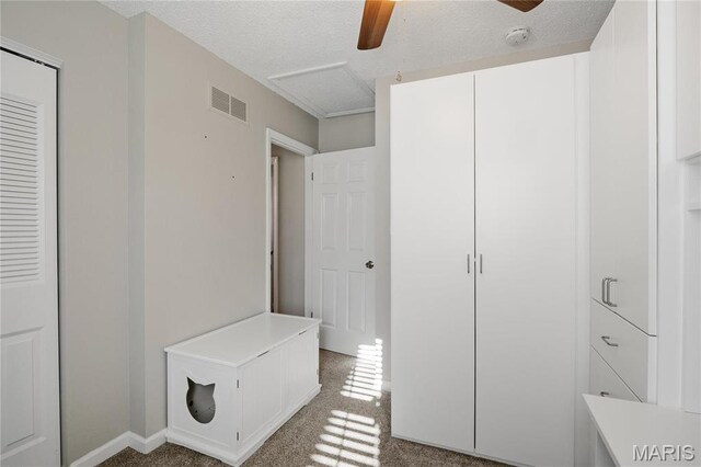 1508 Swallow Dr, Saint Louis, MO 63144 - unfurnished bedroom with a ceiling fan and a textured ceiling
