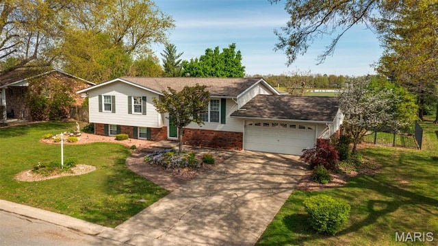 807 W Miller Dr, Staunton, IL 62088 - view of front of home with a garage, driveway, and brick siding