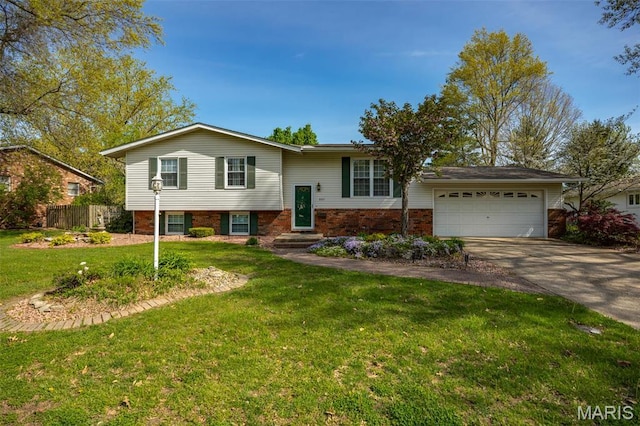 807 W Miller Dr, Staunton, IL 62088 - view of front of property with concrete driveway, an attached garage, and brick siding