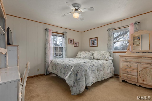 807 W Miller Dr, Staunton, IL 62088 - bedroom with light carpet, ornamental molding, baseboards, and a ceiling fan
