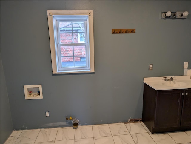 205 Fisher Ave, Sawyerville, IL 62085 - clothes washing area featuring washer hookup, light marble finish floors, and cabinet space