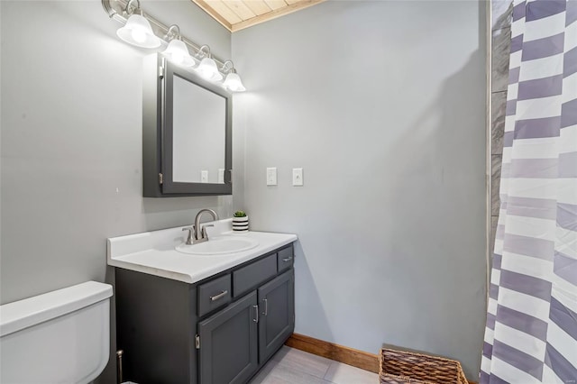291 Deer Run Acres A, Williamsville, MO 63967 - bathroom with toilet, vanity, curtained shower, and baseboards