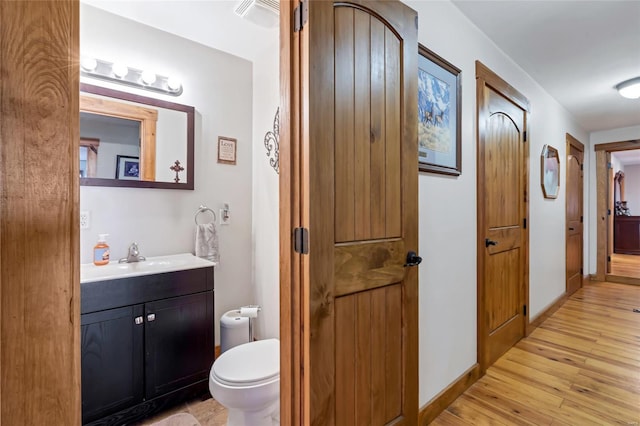 291 Deer Run Acres A, Williamsville, MO 63967 - bathroom with wood finished floors, vanity, and toilet