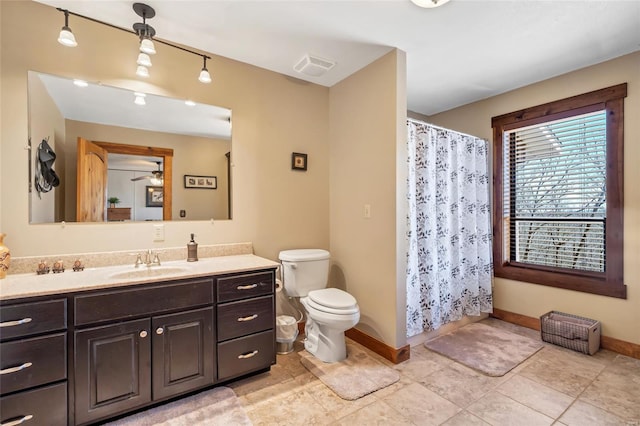 291 Deer Run Acres A, Williamsville, MO 63967 - full bath with baseboards, a ceiling fan, vanity, toilet, and tile patterned floors