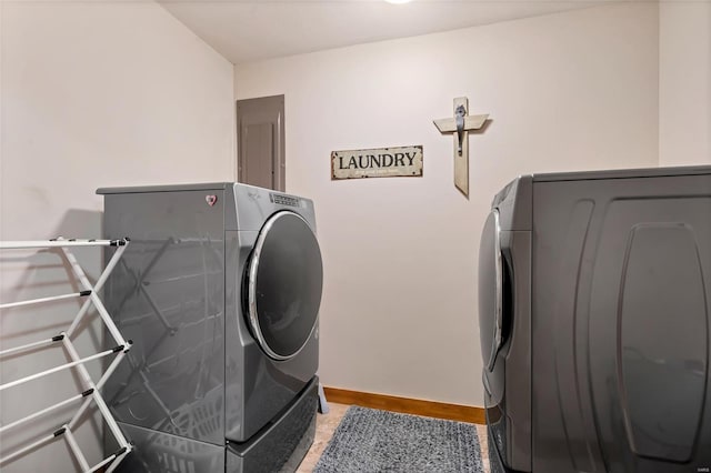 291 Deer Run Acres A, Williamsville, MO 63967 - washroom featuring washing machine and clothes dryer, electric panel, and baseboards