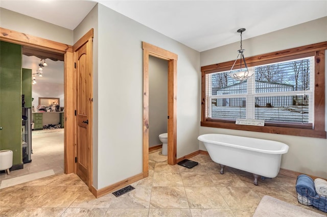 291 Deer Run Acres A, Williamsville, MO 63967 - full bath with a freestanding bath, toilet, and baseboards