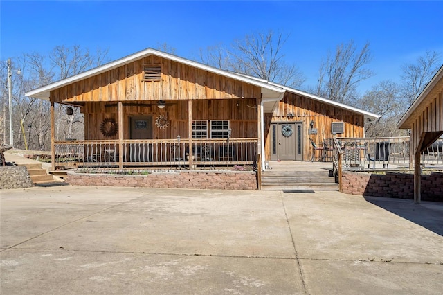 291 Deer Run Acres A, Williamsville, MO 63967 - chalet / cabin with covered porch and board and batten siding