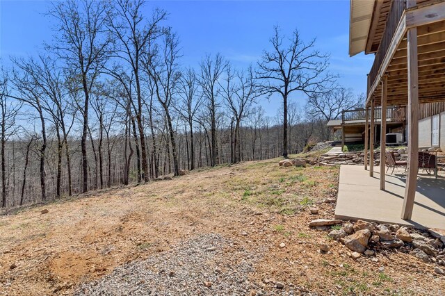 291 Deer Run Acres A, Williamsville, MO 63967 - view of yard with a patio area, a deck, and a view of trees