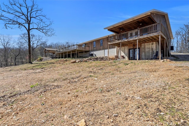 291 Deer Run Acres A, Williamsville, MO 63967 - back of property featuring a wooden deck and a garage