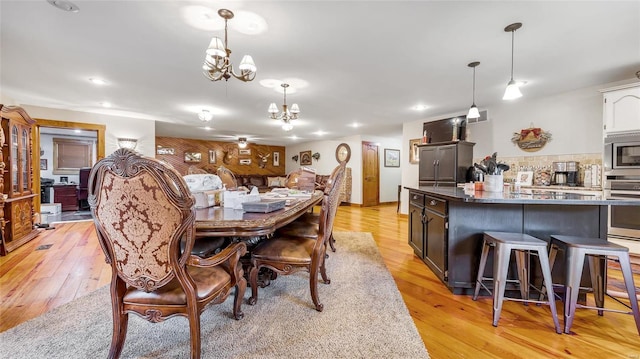 302 Deer Run Acres A, Williamsville, MO 63967 - dining space featuring light wood-style floors, a chandelier, and recessed lighting