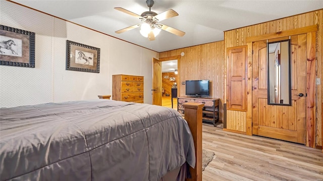 302 Deer Run Acres A, Williamsville, MO 63967 - bedroom featuring light wood-type flooring, wooden walls, crown molding, and ceiling fan