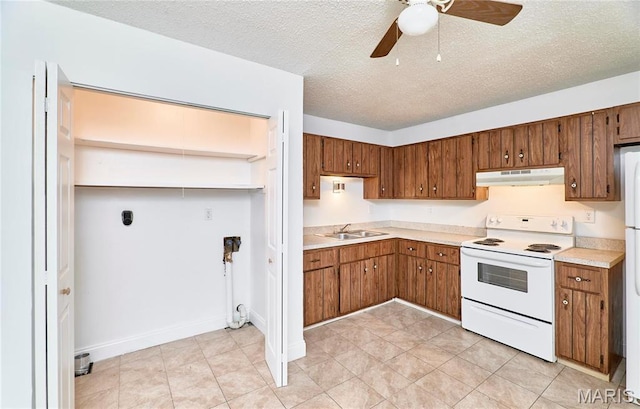285 Mount Everest Dr, Fenton, MO 63026 - kitchen featuring white appliances, under cabinet range hood, brown cabinets, ceiling fan, and light countertops