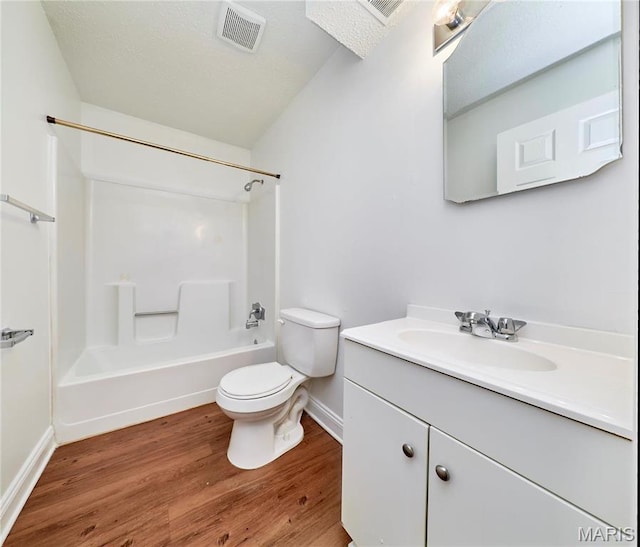 285 Mount Everest Dr, Fenton, MO 63026 - bathroom with toilet, baseboards, wood finished floors, and vanity