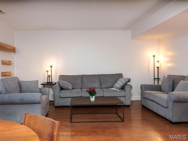 living room with wood finished floors