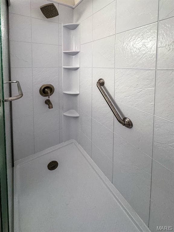full bath featuring a stall shower