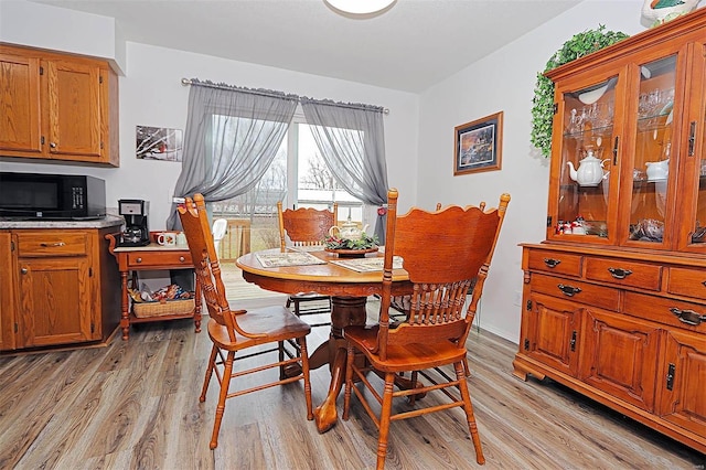 918 Susan St, Dexter, MO 63841 - dining room with light wood finished floors