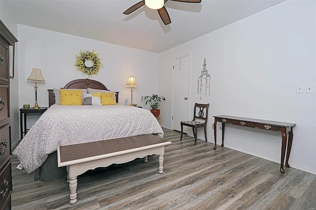 918 Susan St, Dexter, MO 63841 - bedroom with wood finished floors and a ceiling fan