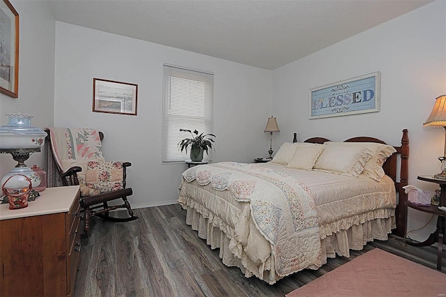 918 Susan St, Dexter, MO 63841 - bedroom with dark wood finished floors and baseboards