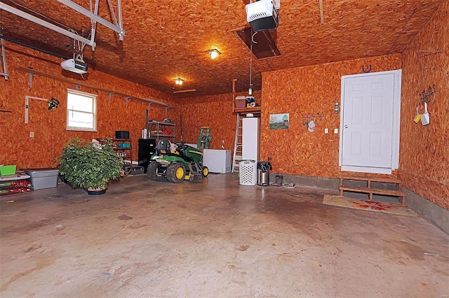 918 Susan St, Dexter, MO 63841 - garage featuring a garage door opener