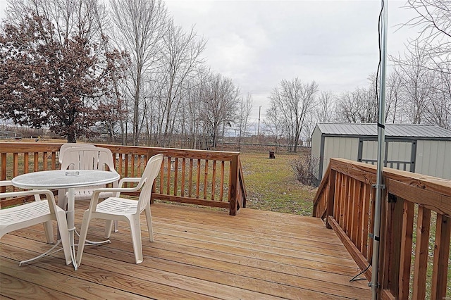 918 Susan St, Dexter, MO 63841 - wooden terrace featuring outdoor dining space
