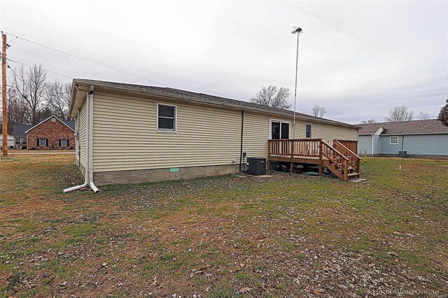 918 Susan St, Dexter, MO 63841 - back of house with a wooden deck, central air condition unit, a lawn, and crawl space