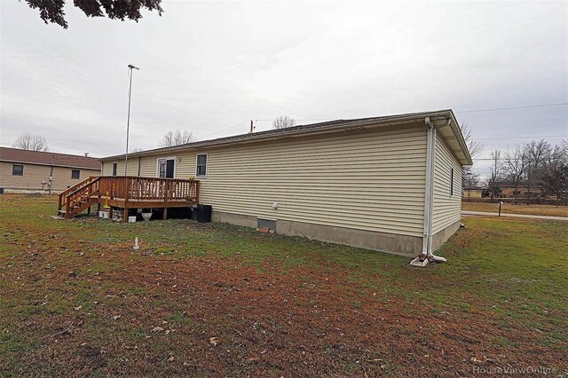 918 Susan St, Dexter, MO 63841 - rear view of house with a deck and a lawn