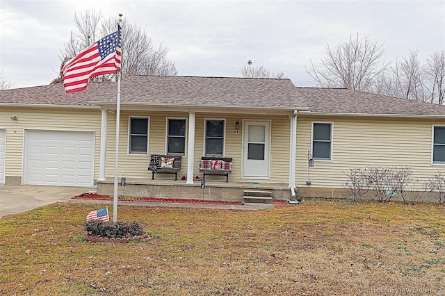 918 Susan St, Dexter, MO 63841 - ranch-style house featuring a porch, an attached garage, concrete driveway, and a front yard