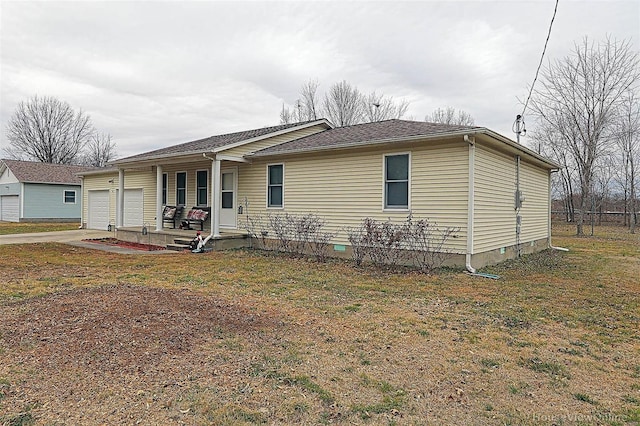 918 Susan St, Dexter, MO 63841 - view of front facade featuring covered porch, crawl space, a garage, driveway, and a front yard