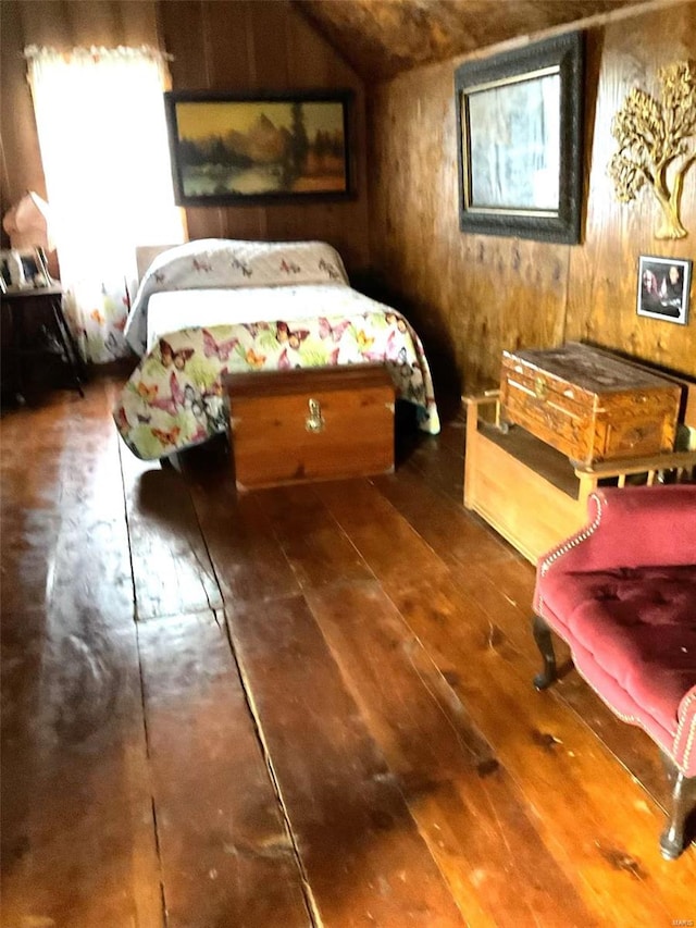 bedroom with hardwood / wood-style flooring