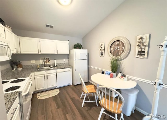 7507 Triwoods Dr Unit J, Saint Louis, MO 63119 - kitchen featuring white appliances, a sink, lofted ceiling, white cabinets, and dark wood-type flooring