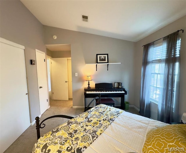 7507 Triwoods Dr Unit J, Saint Louis, MO 63119 - carpeted bedroom with lofted ceiling and baseboards