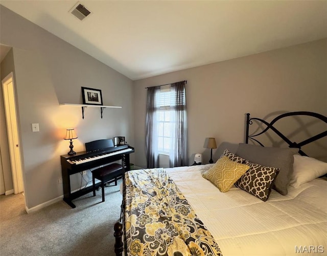7507 Triwoods Dr Unit J, Saint Louis, MO 63119 - bedroom featuring carpet floors, vaulted ceiling, and baseboards