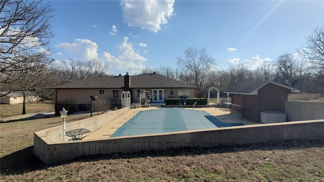 319 County Road 2270, Salem, MO 65560 - view of pool with french doors, an outbuilding, a patio, and a shed