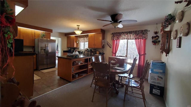 319 County Road 2270, Salem, MO 65560 - dining area featuring a ceiling fan and tile patterned floors