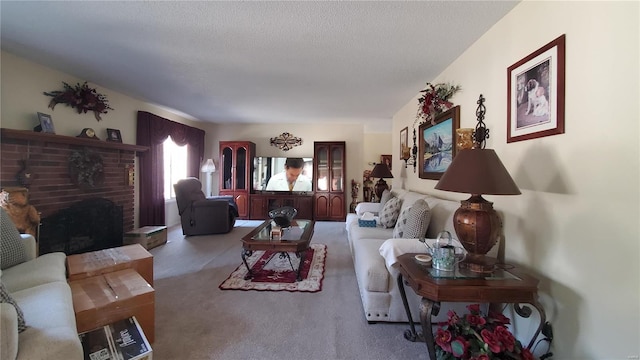 319 County Road 2270, Salem, MO 65560 - living room featuring carpet floors, a brick fireplace, and a textured ceiling