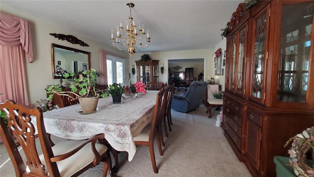 319 County Road 2270, Salem, MO 65560 - dining area with a chandelier and light colored carpet