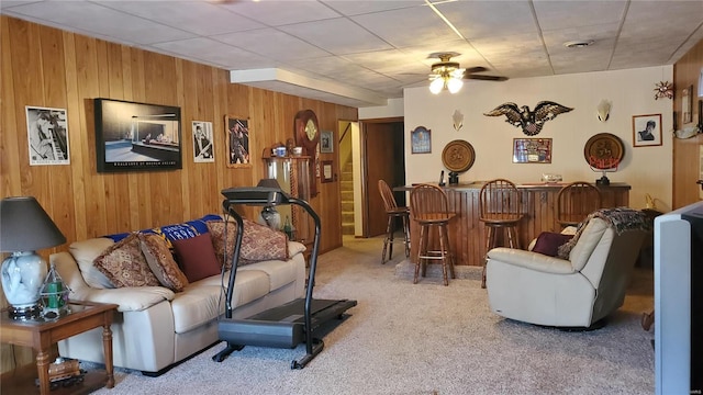 319 County Road 2270, Salem, MO 65560 - living area with a dry bar, carpet flooring, wood walls, and ceiling fan