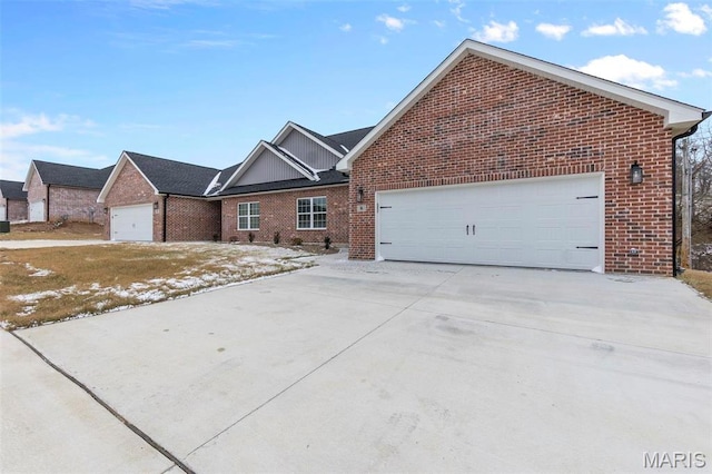 4 Creekside Way, Cape Girardeau, MO 63701 - view of front of property with brick siding, concrete driveway, and an attached garage
