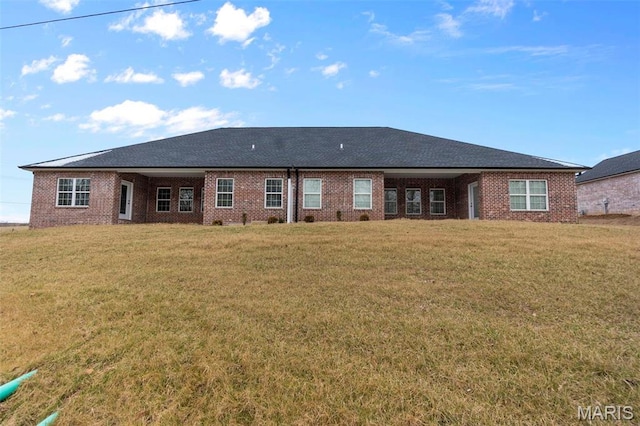 4 Creekside Way, Cape Girardeau, MO 63701 - rear view of house with brick siding and a lawn