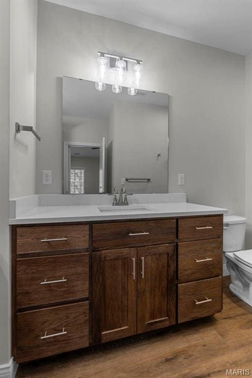 4 Creekside Way, Cape Girardeau, MO 63701 - bathroom featuring vanity and wood finished floors