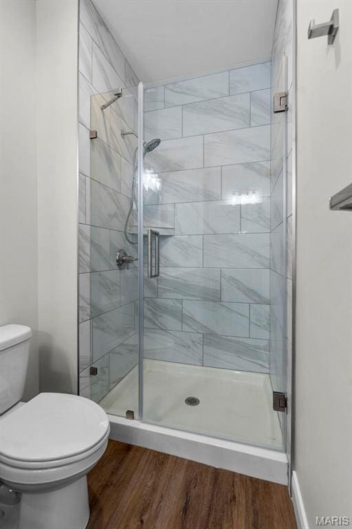 4 Creekside Way, Cape Girardeau, MO 63701 - bathroom featuring a stall shower and wood finished floors