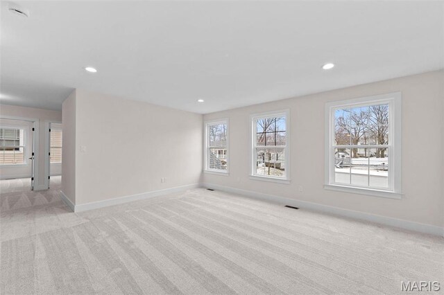 629 Simmons Ave, Saint Louis, MO 63122 - empty room with light carpet, baseboards, and recessed lighting